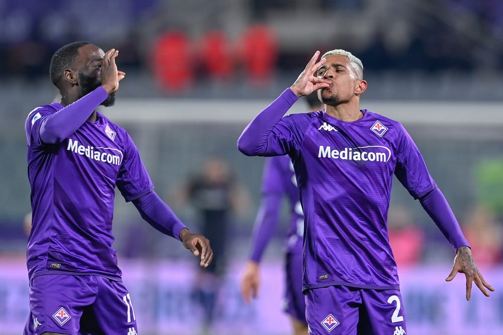 "Dodo" and Jonathan Ikone celebrate after a goal.