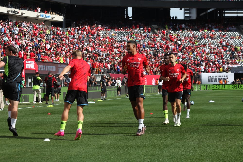 Arsenal players warm up