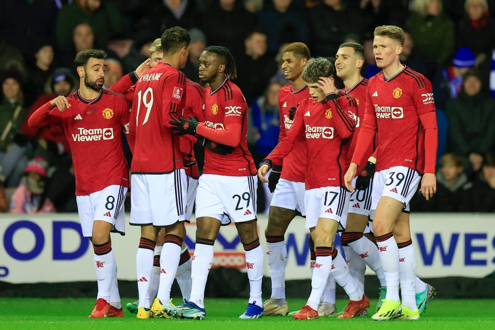 Manchester United players celebrate a goal