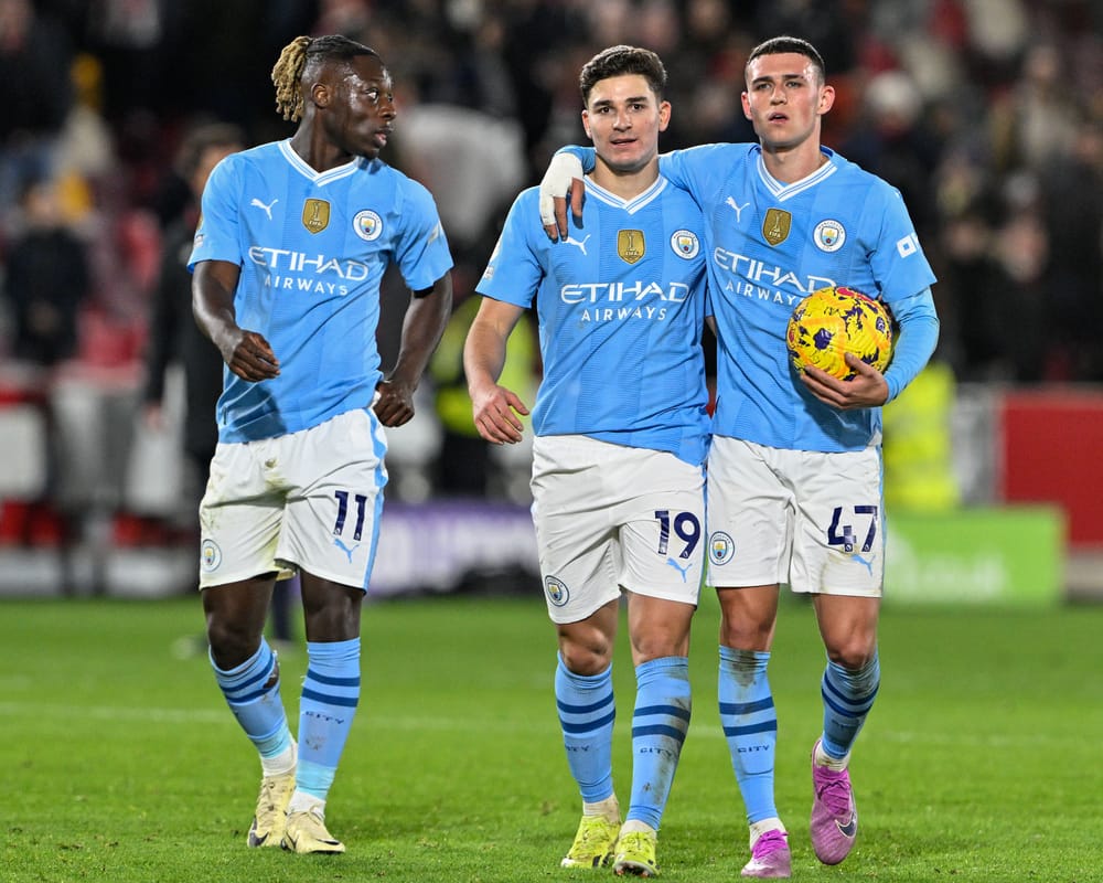 Jérémy Doku, Julián Álvarez and Phil Foden after win.
