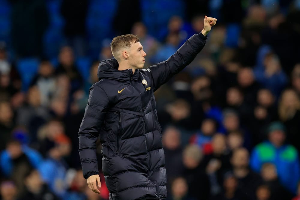 Cole Palmer of Chelsea gives a thumbs up to the fans.