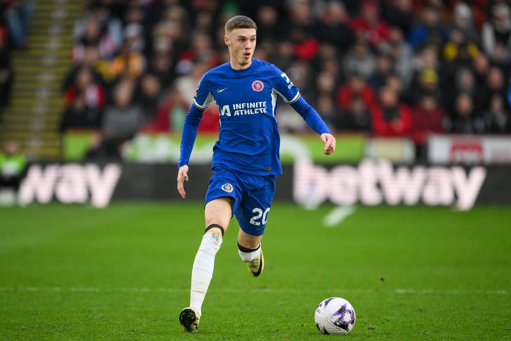 Cole Palmer of Chelsea makes a break with the ball.